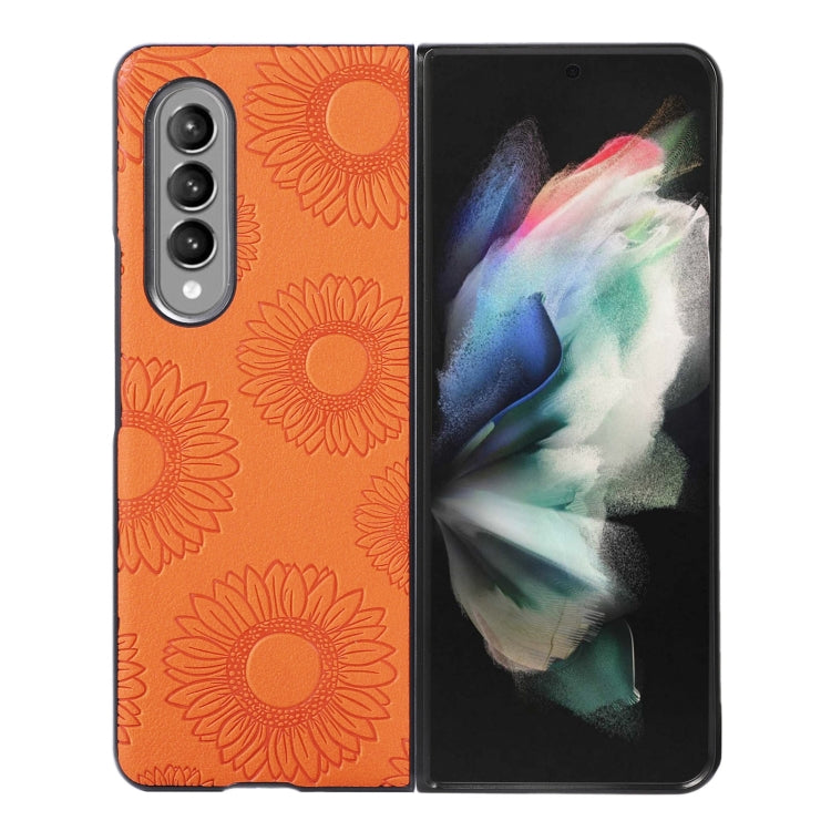 Orange sunflower patterned shockproof phone case with camera cutouts and raised edges