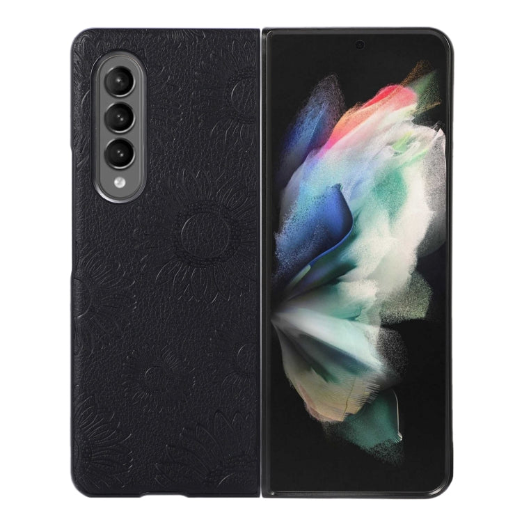 Black sunflower textured shockproof phone case with camera cutouts and raised edges