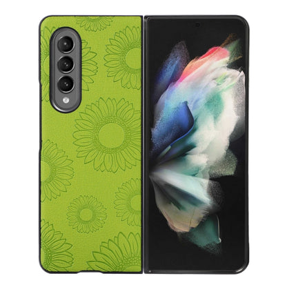 Light green sunflower patterned shockproof phone case with camera cutouts and raised edges