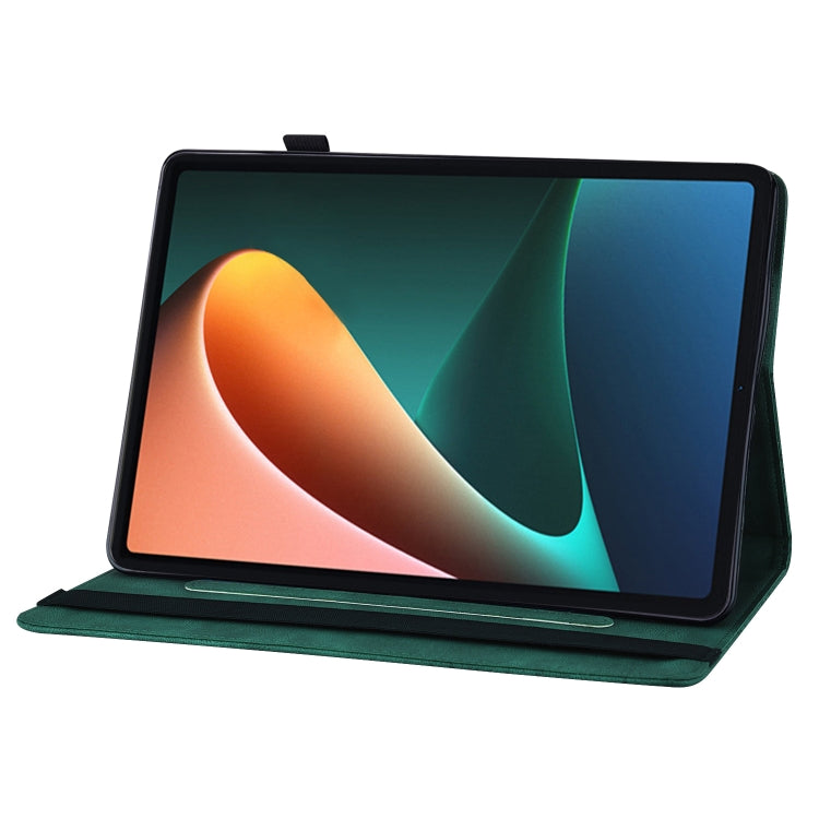 Green embossed butterfly leather tablet folio case holding tablet on stand