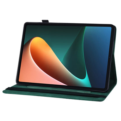 Green embossed butterfly leather tablet folio case holding tablet on stand