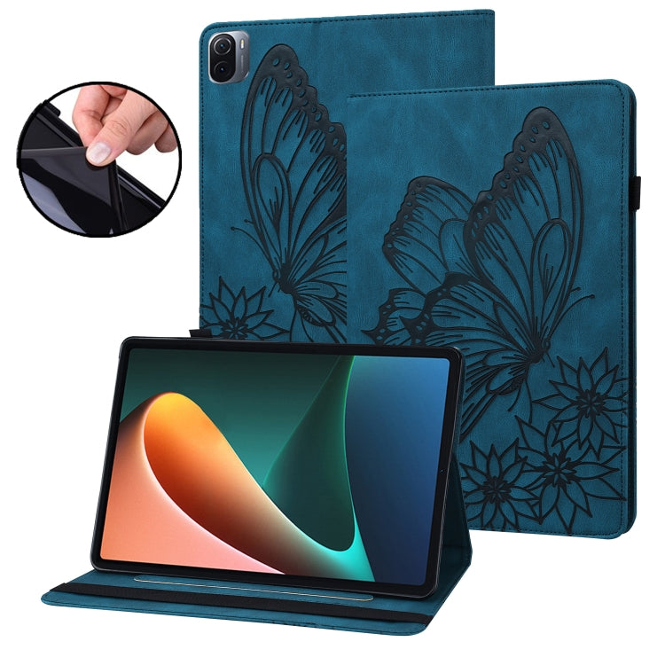 Blue embossed butterfly leather tablet folio case holding tablet on stand