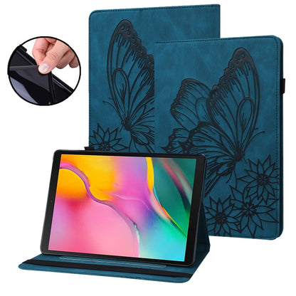 Blue embossed butterfly smart tablet case with kickstand, tablet showing colorful display.