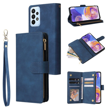 Blue leather flip phone wallet case with wrist strap, zip pocket, and card holder.