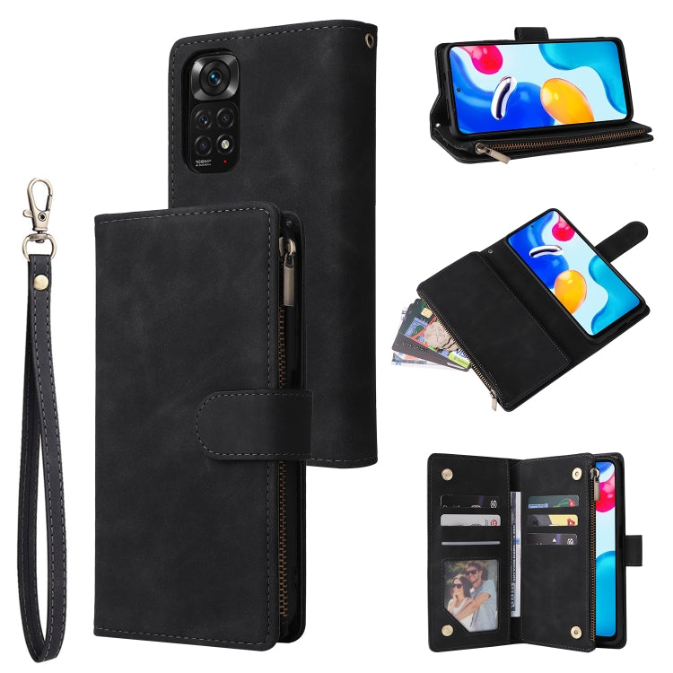 Black leather flip phone wallet case with wrist strap, zip compartment, and card pockets.