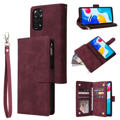 Wine red leather phone wallet case with frosted zipper, card slots, and wrist strap.