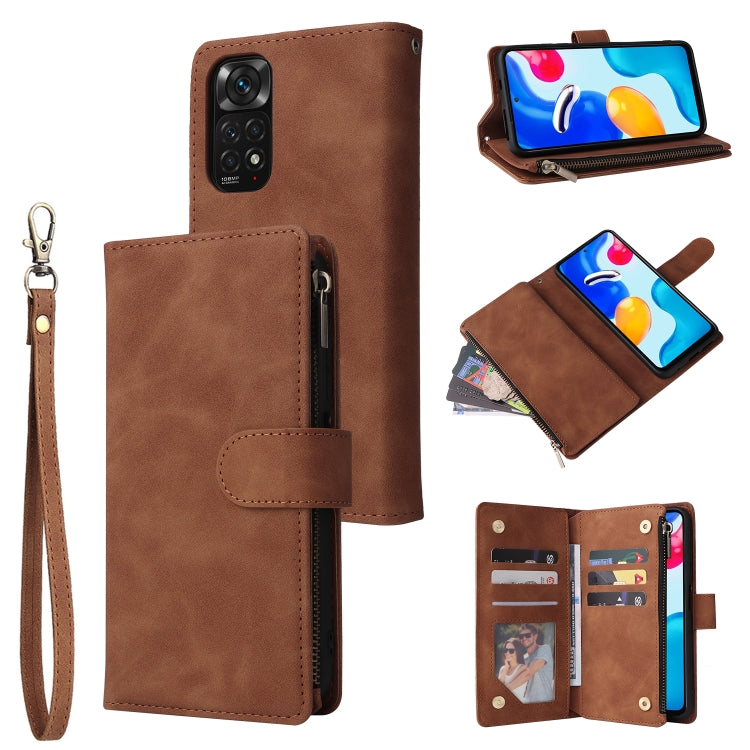 Brown leather phone wallet case with wrist strap, zipper, and multiple card slots.