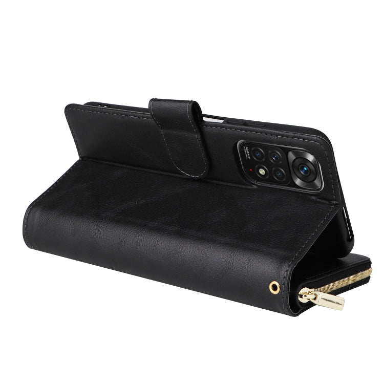 Black leather folio phone case with stand support and wrist strap, zipper closure.
