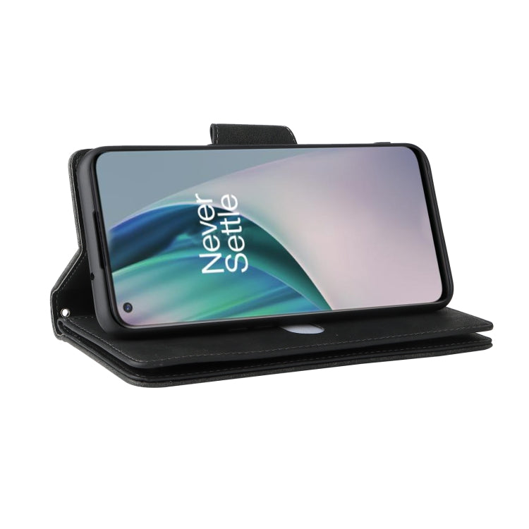 Black leather folio phone case with front cover and cutout for camera and ports