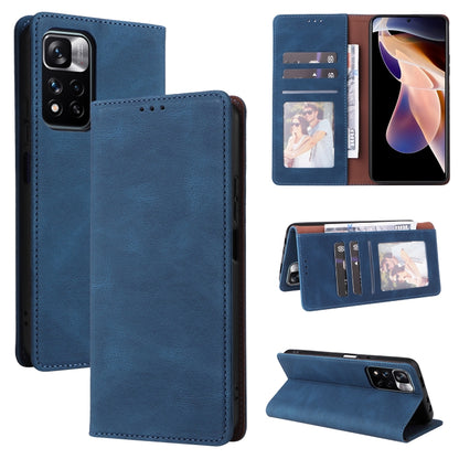 Blue leather folio phone case with card slots and suction closure, textured finish