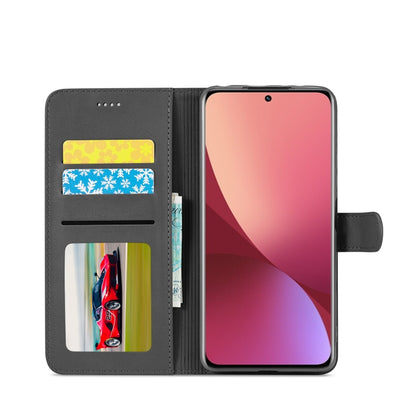 Gray flip leather phone case with card slots and stand cover, showing phone screen; dark gray
