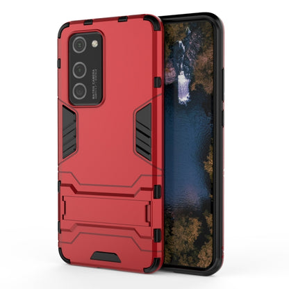 Red rugged shockproof phone case with black TPU accents and raised bumper protection