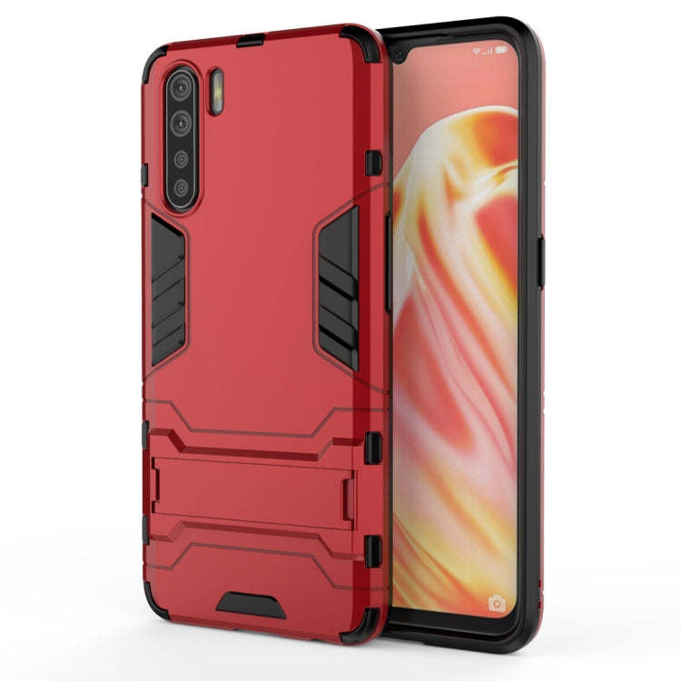 Red shockproof protective phone case with black armor panels and camera and port cutouts