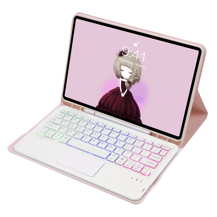 Pink leather tablet case with backlit Bluetooth keyboard and angled folio stand.