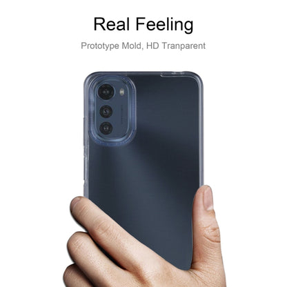 Ultra-thin clear TPU phone case shown on phone back; soft, slim fit