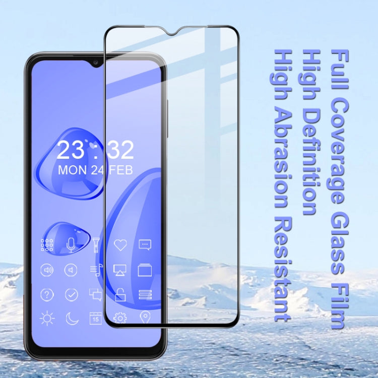 Tempered glass full-screen protector installed on smartphone, clear film with black frame