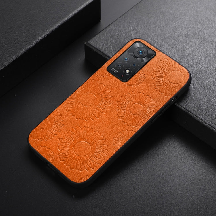 Orange sunflower patterned PU phone case with raised floral texture and camera cutout
