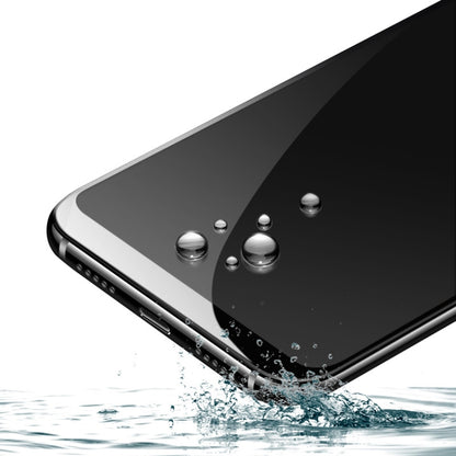 Tempered glass screen protector on phone front, splash and impact protection
