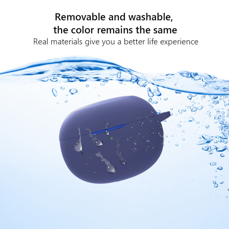 Blue silicone earphone protective case shown under water with bubbles
