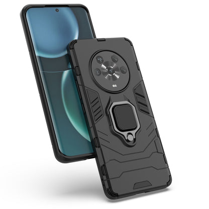 Shockproof phone case, black with magnetic ring holder, phone screen facing left