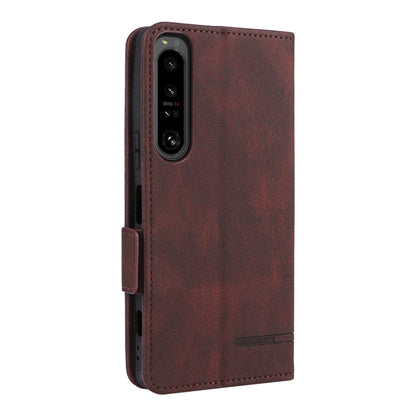 Brown leather flip phone case with camera cutout and side strap