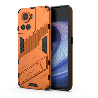 Orange rugged phone case with raised camera guards and textured impact panels