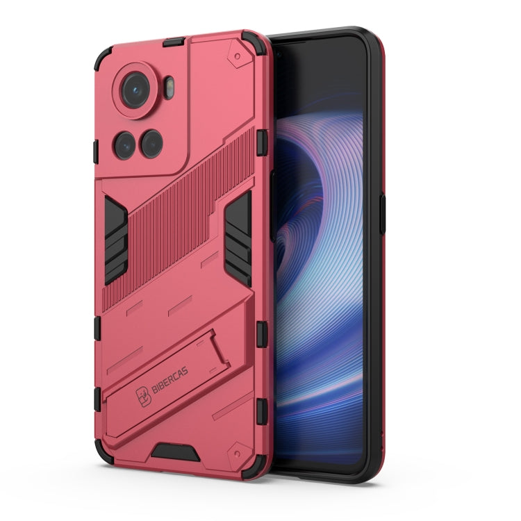 Pink rugged phone case with raised camera guards and textured impact panels