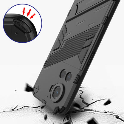 Dark armored phone case with rugged edges and camera cutouts