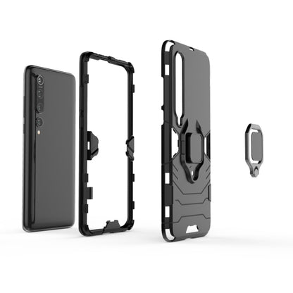 Black shockproof phone case with magnetic ring holder, phone and case pieces