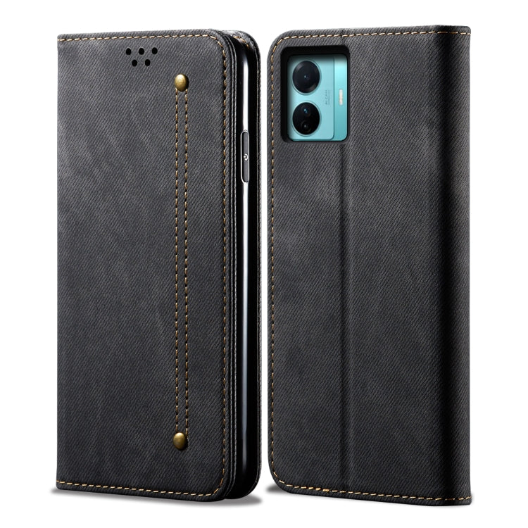 Dark denim-texture leather phone case with stitched panel and camera cutout