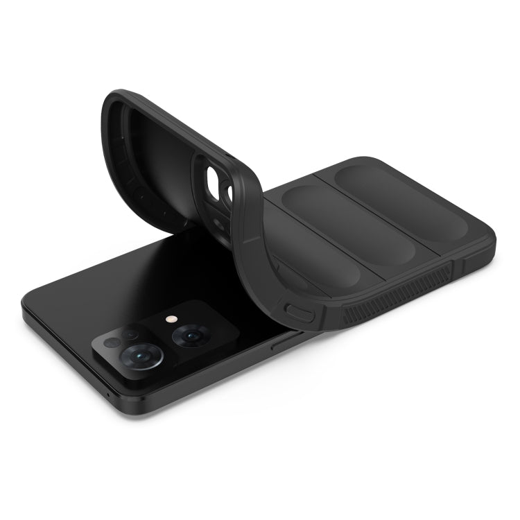 Black protective phone case with raised grip panels, back cover folded open