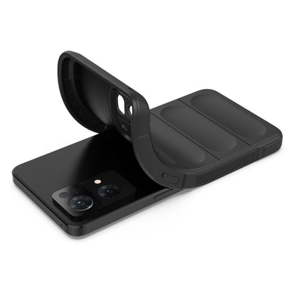 Black protective phone case with raised grip panels, back cover folded open