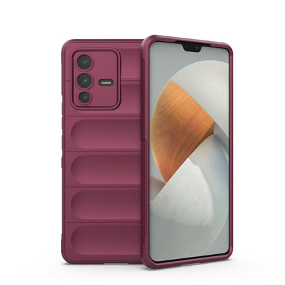 Wine red TPU phone case with ridged bumper panels and camera cutouts.