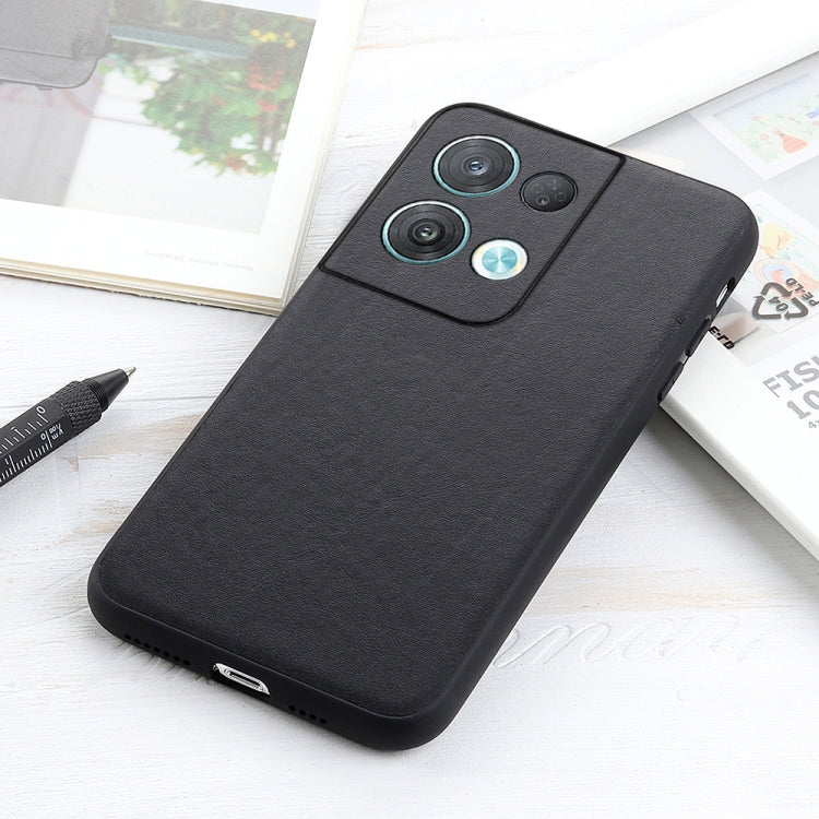 Black genuine leather phone case with camera cutout and raised camera area