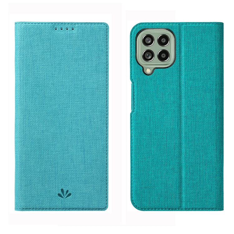 Turquoise flip phone case with textured fabric and cutouts for camera and speaker