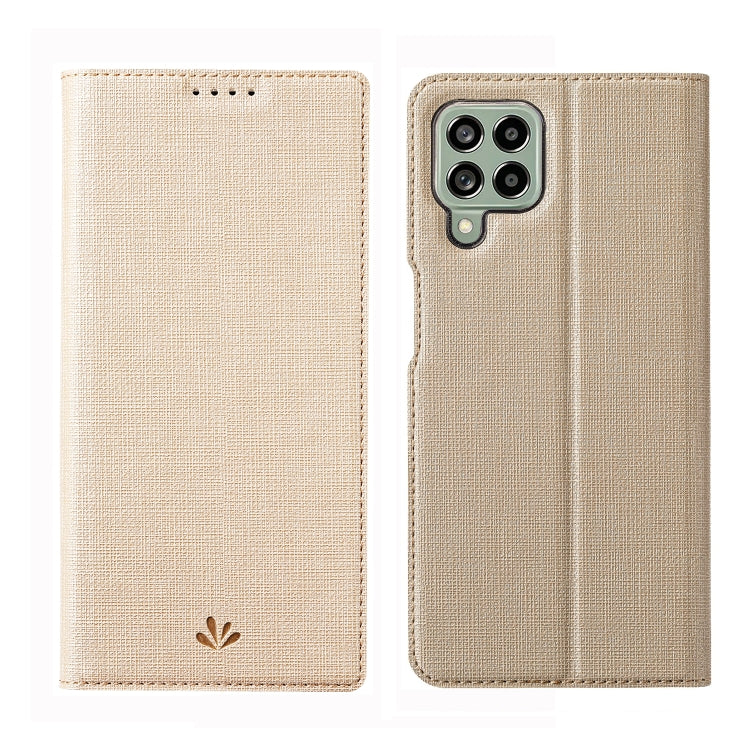 Beige flip phone case with textured fabric and camera cutout on the back