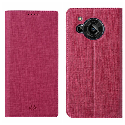 Magenta/pink flip phone case with textured fabric and camera lens opening