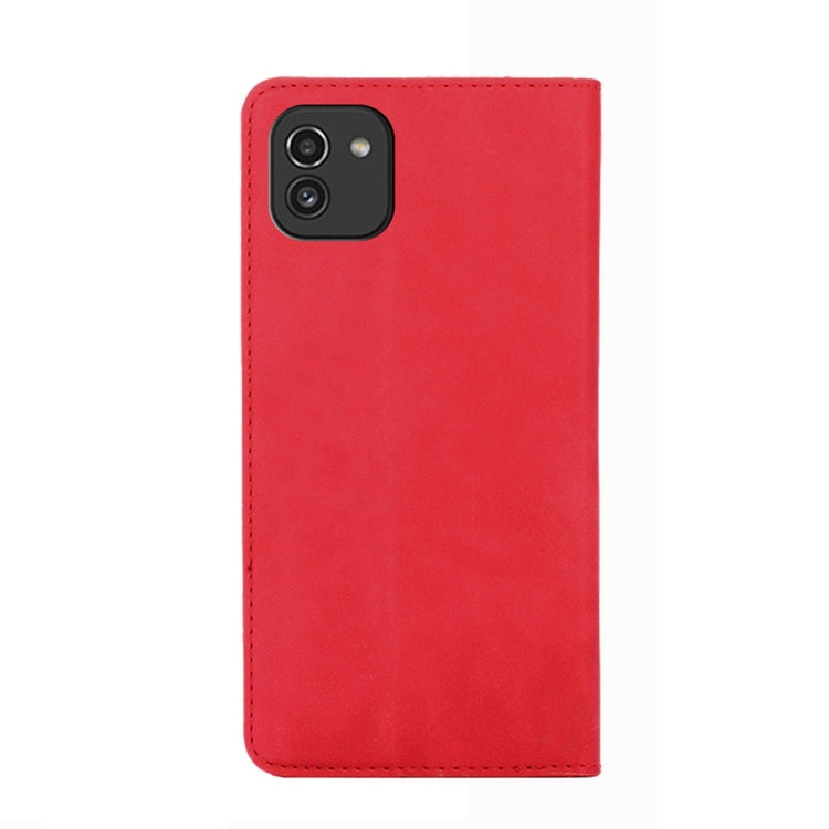 Red leather flip phone case, back view with camera cutout