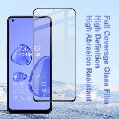 Full-screen clear tempered glass film on smartphone, covering the front display