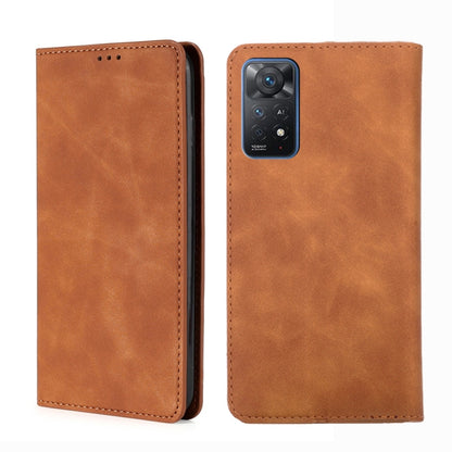 Brown leather flip phone case with stitched edges and camera cutout on the back shell