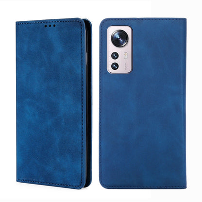 Blue leather flip phone case with stitched edges and camera cutout on the back shell