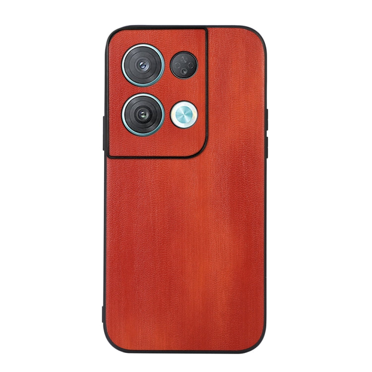 Red PU phone case with textured finish and cutouts for triple cameras and flash