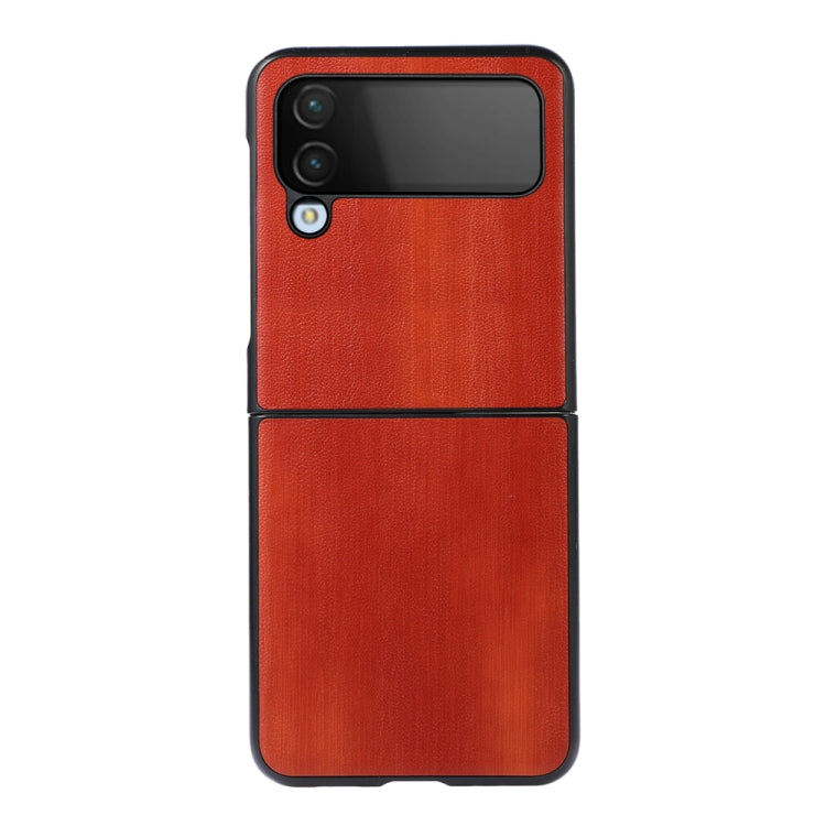 Orange-red PU phone case with textured finish and cutouts for cameras and flash
