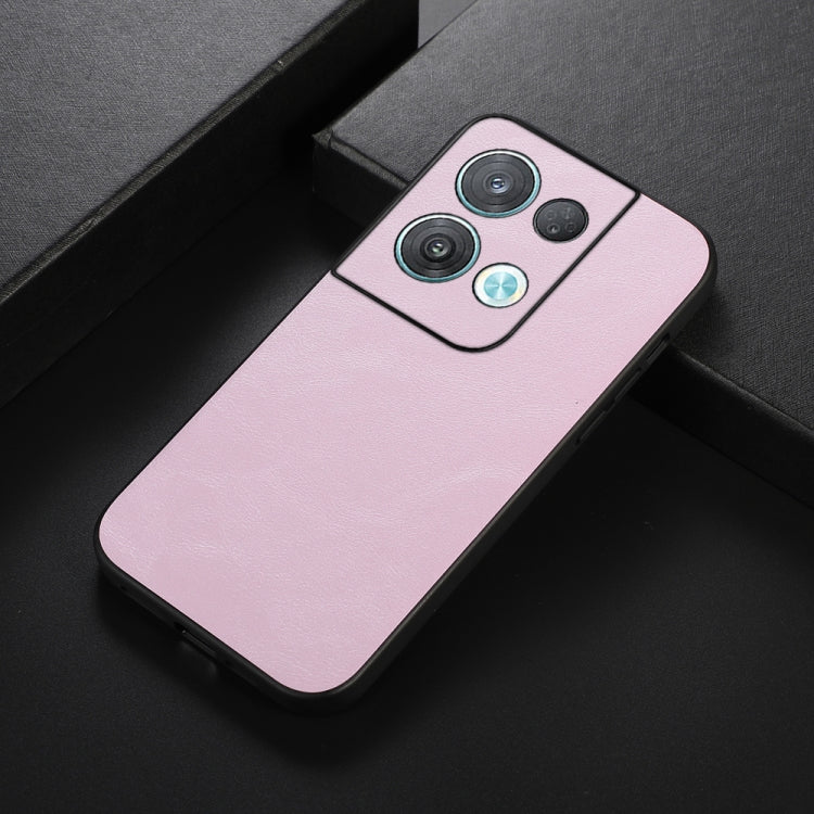 Pink cowhide-texture PU phone case angled view, with camera cutouts