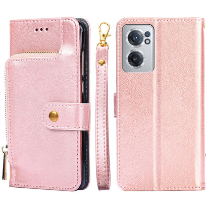 Pink leather folio phone case with card slot, magnetic strap, and zipper wrist strap