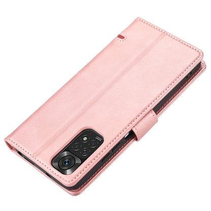 Pink wallet flip phone case with camera cutout and folio strap at the side