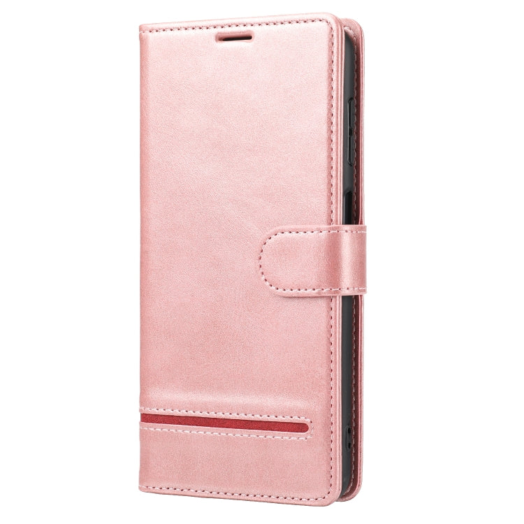 Pink leather flip phone case with stitched strap and button cutout