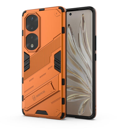 Rugged phone case, orange hard shell with dual camera cutouts and shockproof armor
