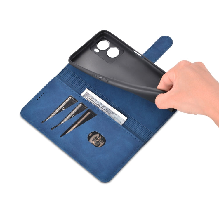 Blue flip phone case with hand holding, showing internal card slots and latch