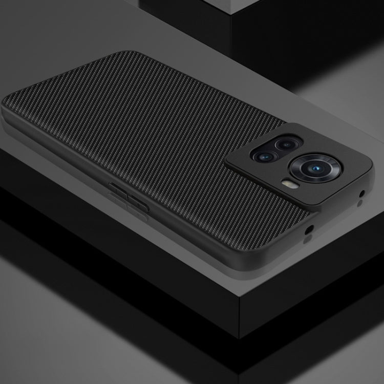 Black carbon-fiber textured phone case with side buttons and camera module opening